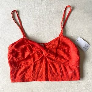 Bright orange crop top